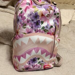 Sprayground Floral Backpack with Pink and Purple Design